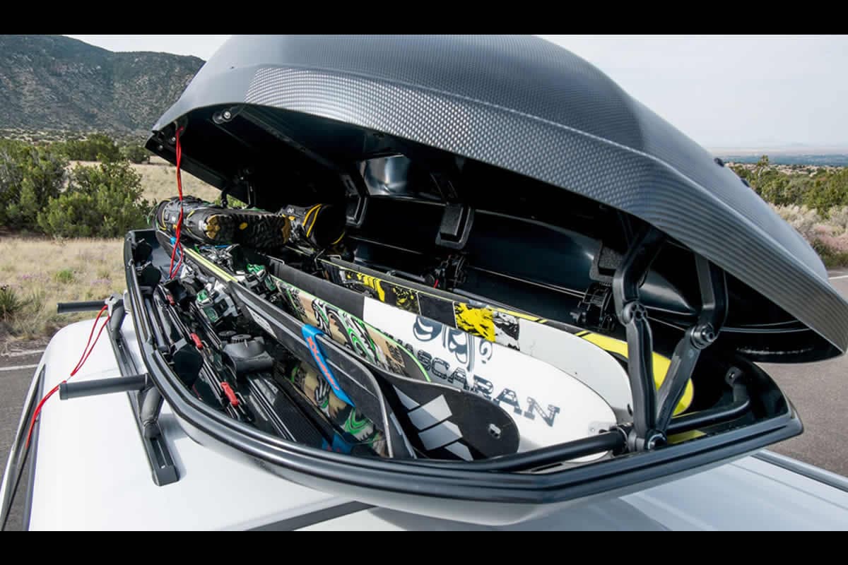 Open Yakima SkyBox cargo box ready for skis and winter trip gear